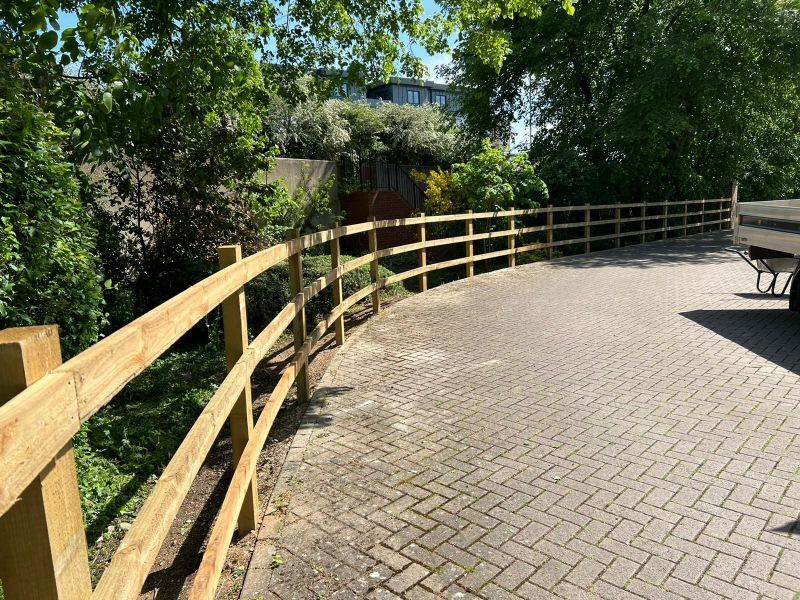 Curved post and rail fencing in Thame